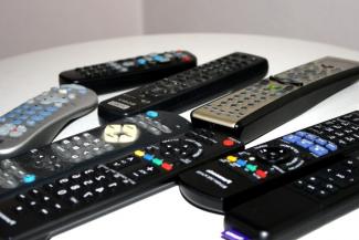 A table of TV remotes