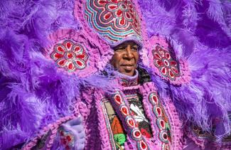 Man In Mardi Gras Outfit