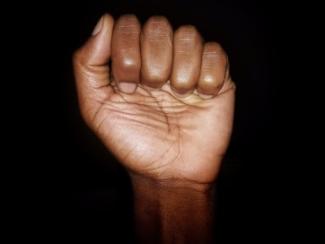 black person's fist raised