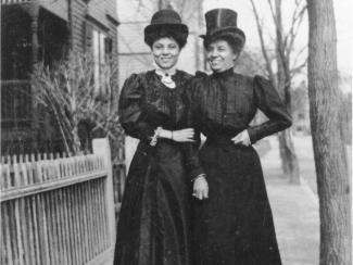two women dressed formally circa early 1900s