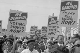 protestors with signs at the March on Washington