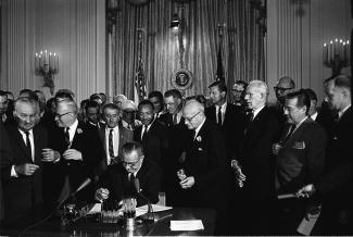 President Johnson signing Civil Rights Act