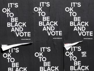 poster that says its okay to be black and vote