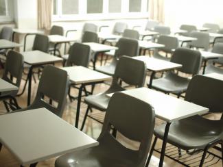 Empty desks in classroom