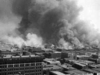 Buildings on fire during Tulsa Massacre