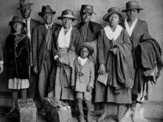 Black family with luggage during Great Migration