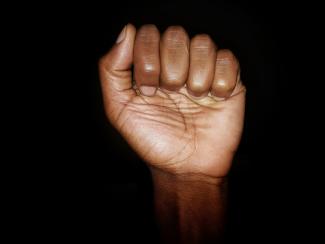Black power fist raised