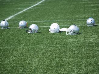 Football helmets on field