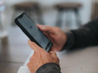 person holding a cell phone 