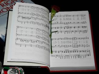 open song book with lyrics