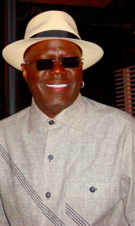 bernie mac in sunglasses smiling