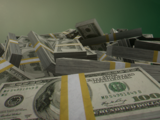 bundles of money in a pile
