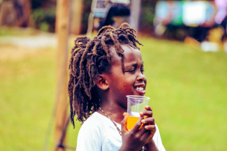 young black child in free form dreadlocks