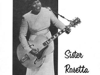 sister rosetta playing a guitar