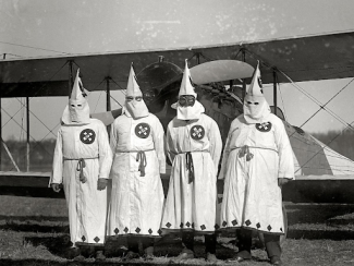 kkk members standing together outside