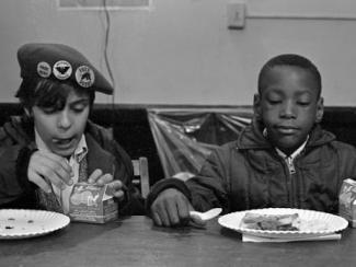 black children eating breakfast