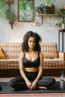 black woman doing yoga
