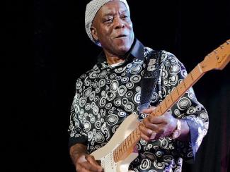 buddy guy playing a guitar