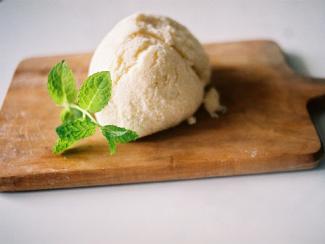 ice cream on a wooden cutting board