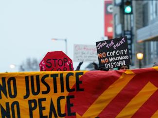 sign that says no justice no peace