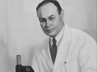 dr charles drew in a lab coat