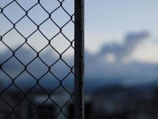 black metal fence during daytime