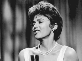 dorothy dandridge in front of a microphone
