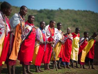 line of maasai people standing together