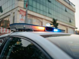 a close up of a police car with its lights on
