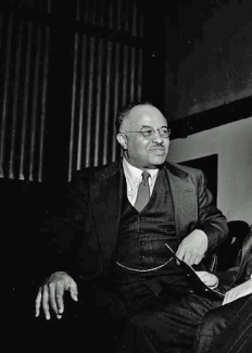 Edward Franklin Frazier sitting down