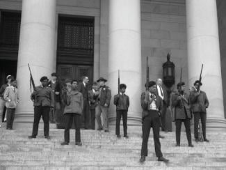 black panthers holding a demonstration on steps