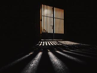 jail cell with light coming through 
