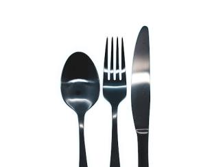 silver spoon, fork and knife on white background