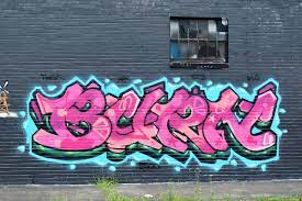 graffiti on black grayish wall 