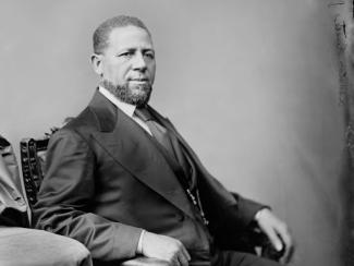 hiram rhodes sitting down 