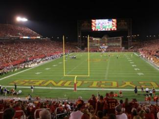 photo of the jack trice stadium at capacity during the night time