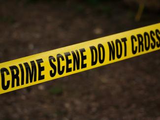 tape that says crime scene do not cross