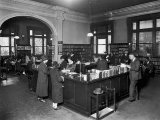 carnegie louisville free public library with patrons inside