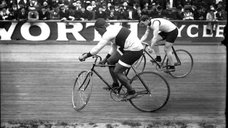major taylor racing on a bicycle