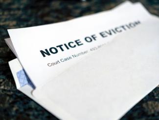 a close up of a piece of paper with notice of eviction on it