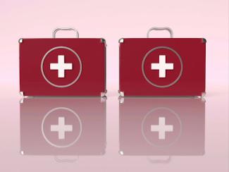 red suitcases with white crosses on them