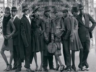 group of young black men and women standing together 