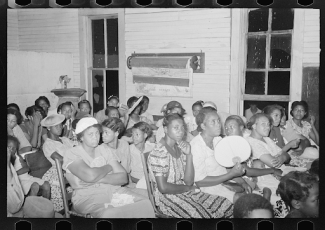 group of black women at revival meeting 