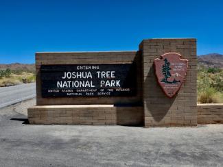 a sign for the joshua tree national park