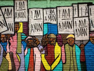 painting of people holding signs at a protest 