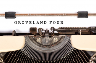 "Groveland Four" printed on paper in a typewriter
