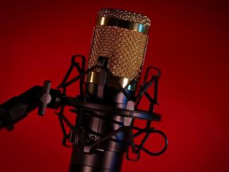 microphone in front of a red background
