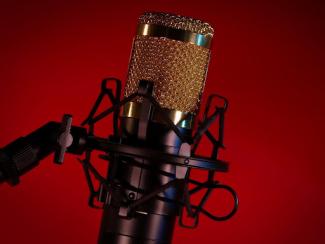 microphone in front of a red background