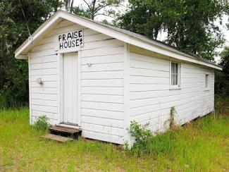 house that has a sign that says prairie house 
