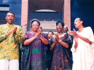 the freedom singers standing together